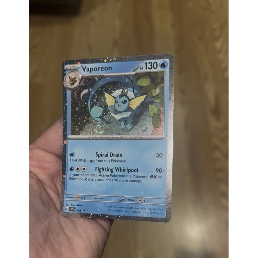 168 promo Vaporeon cosmos holo FART SWIRL🌀  Pokemon card dmg/hp